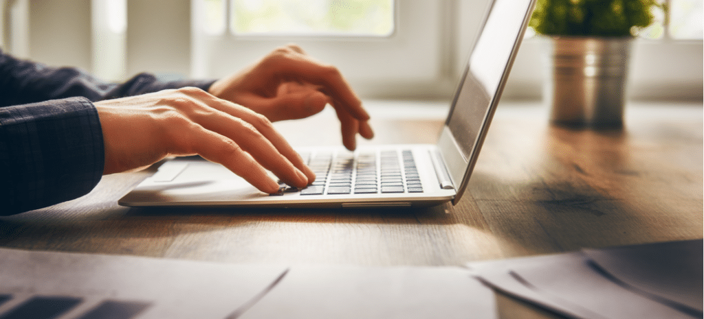 Professional setting up a staging site on his laptop